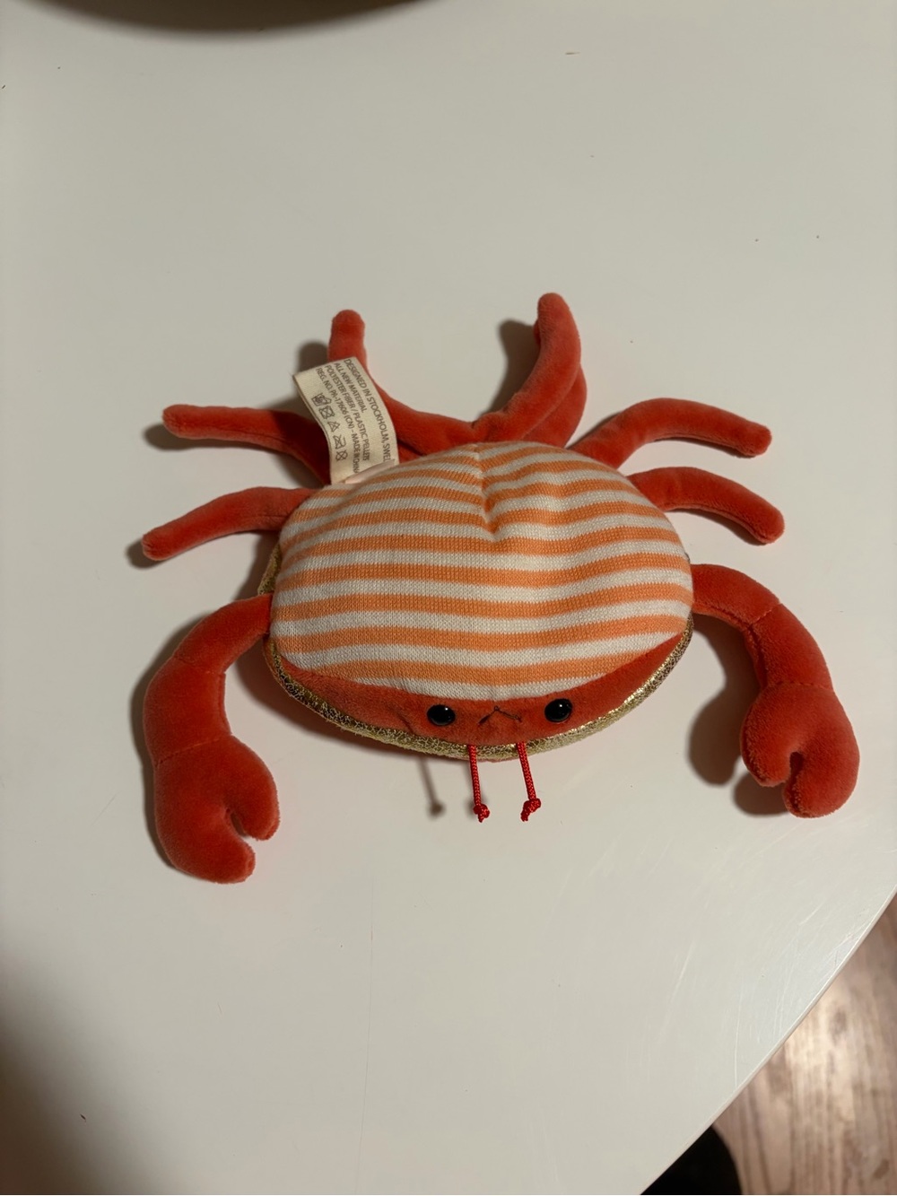 Bukowski orange striped crab plush